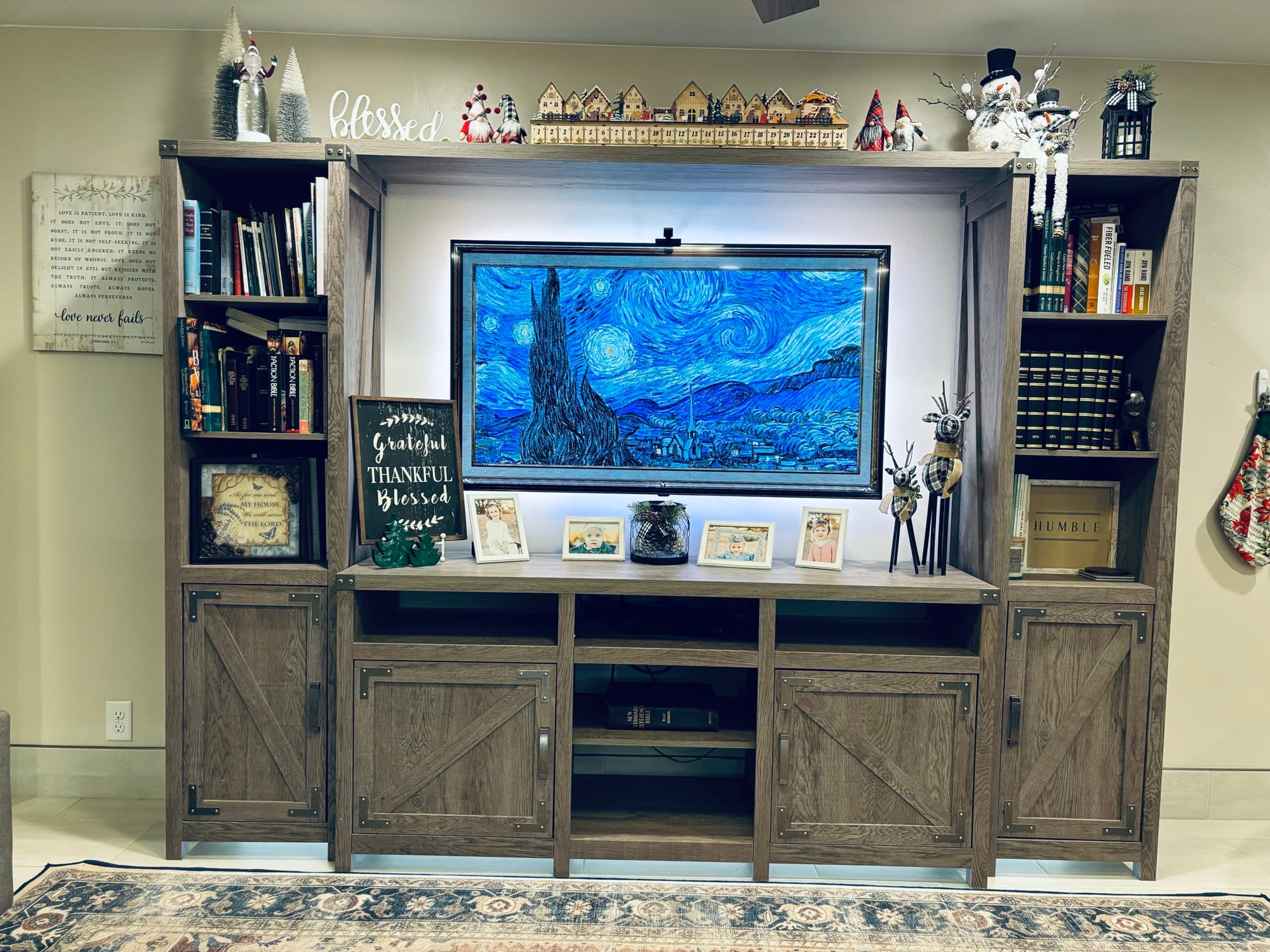 Custom entertainment center with integrated AV and scene lighting at night