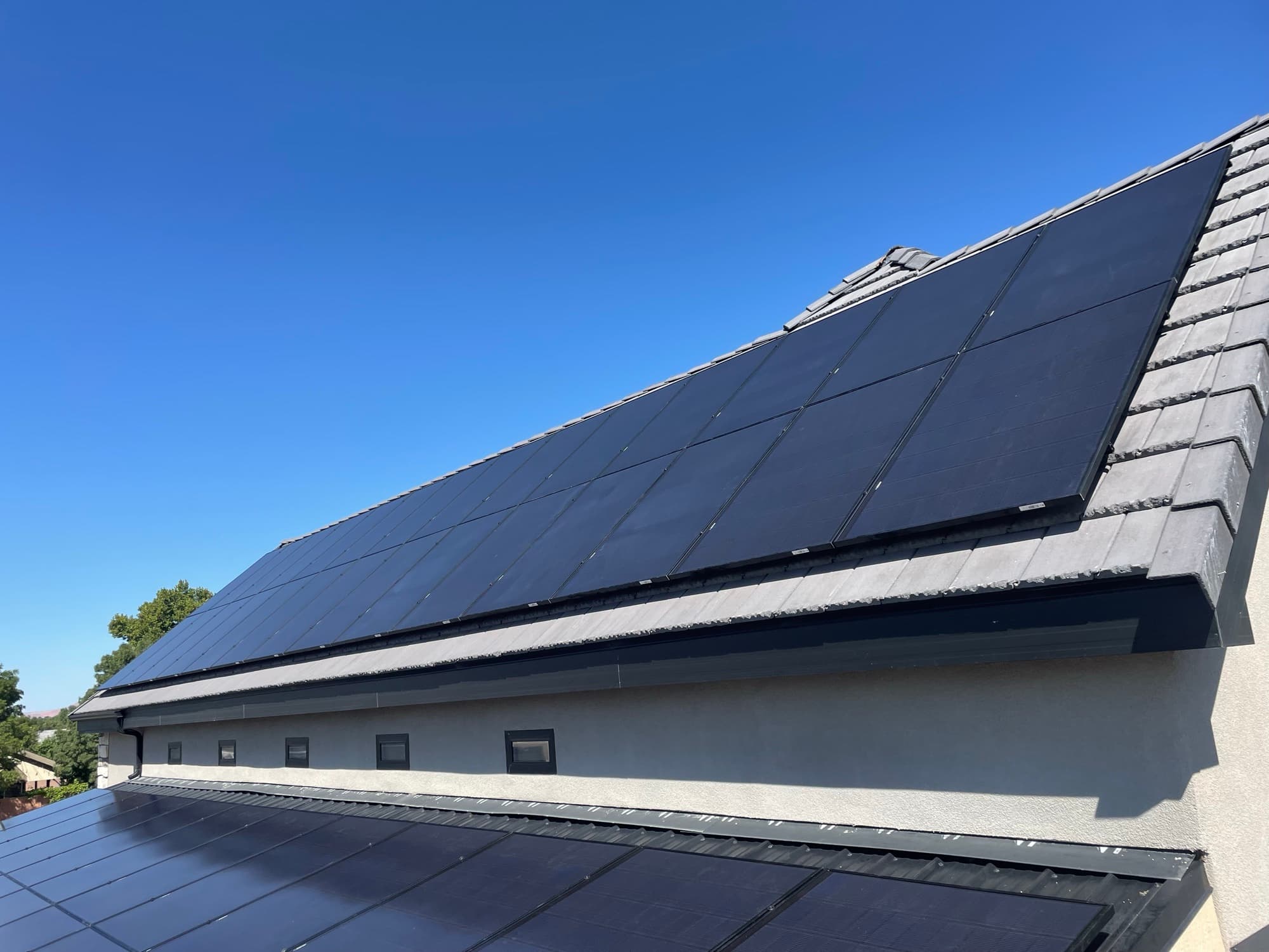 Close-up of residential solar panels installed on a roof